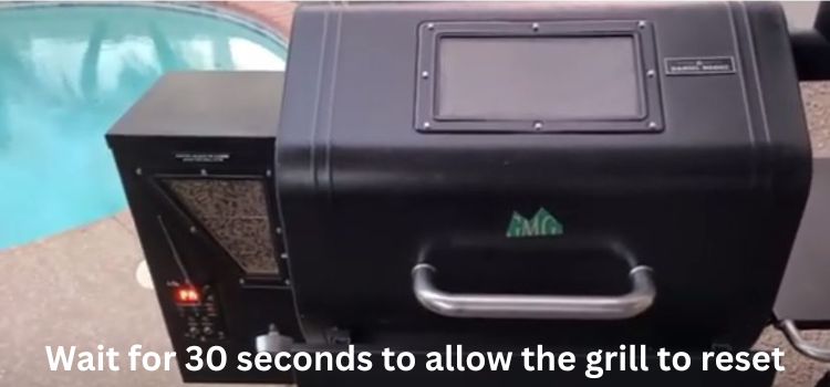 Wait for 30 seconds to allow the grill to reset
